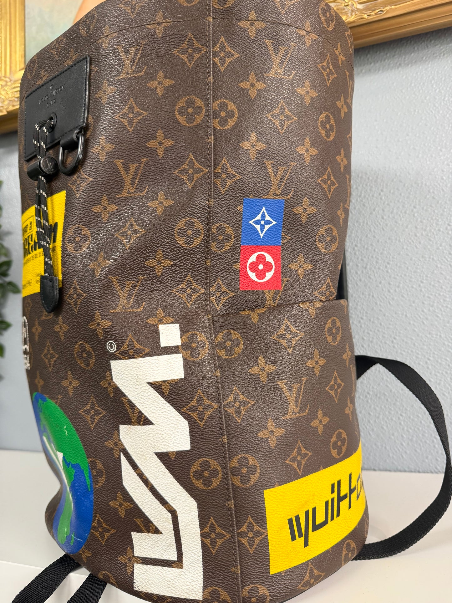 LOUIS VUITTON BROWN STORY MONOGRAM CHALK BACKPACK