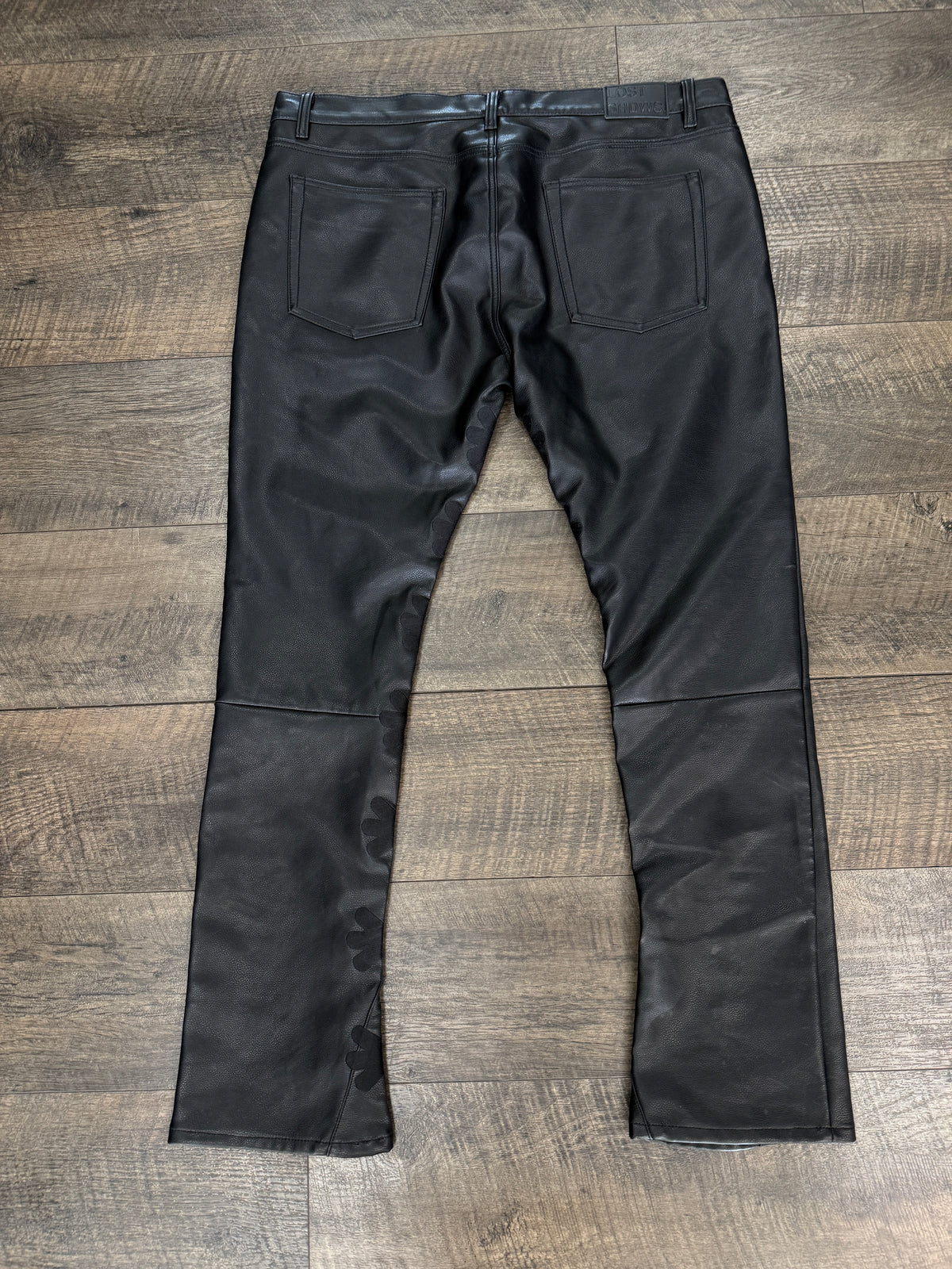 LOSTSHDW FLORAL FAUX LEATHER PANTS