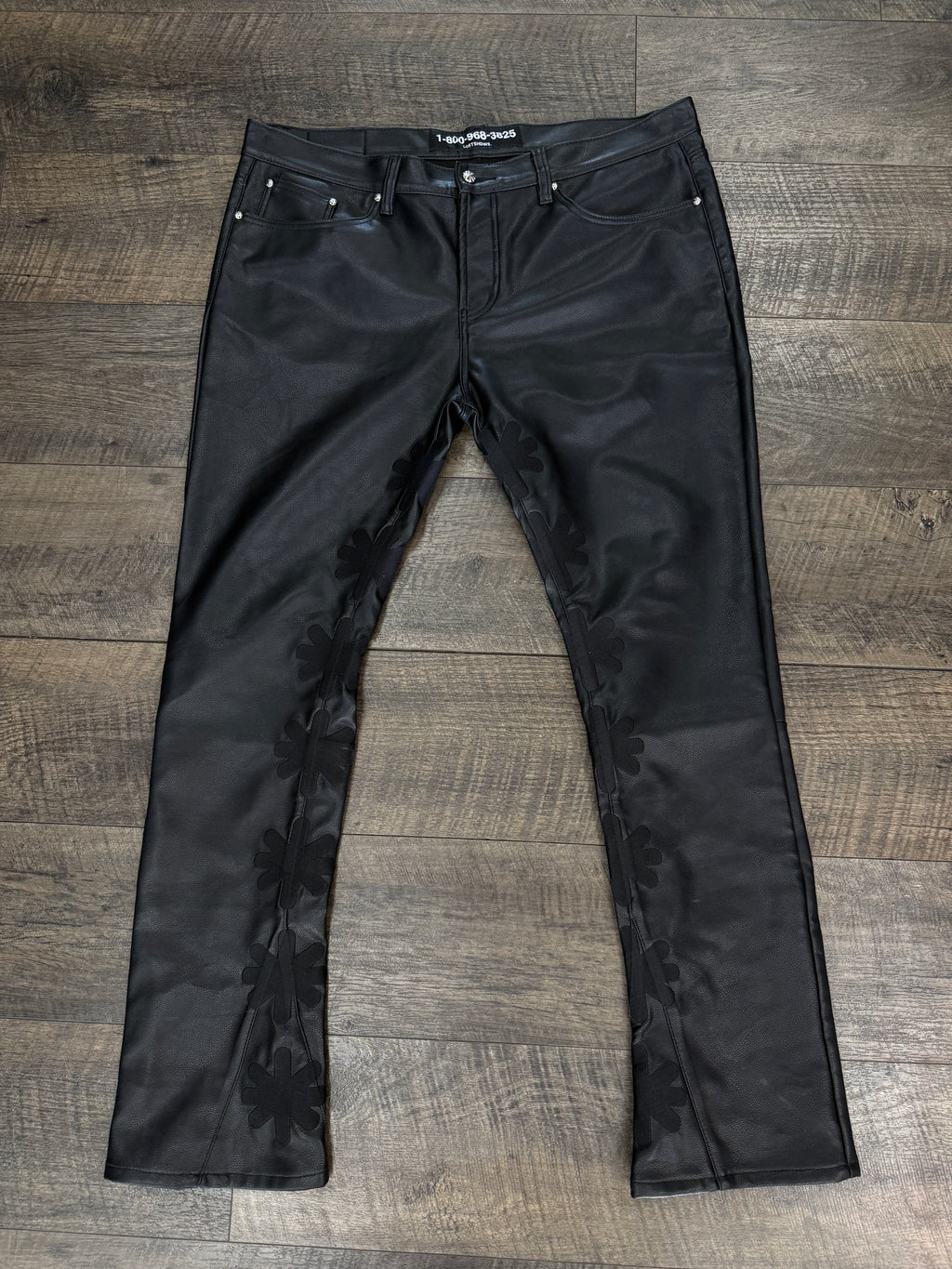 LOSTSHDW FLORAL FAUX LEATHER PANTS