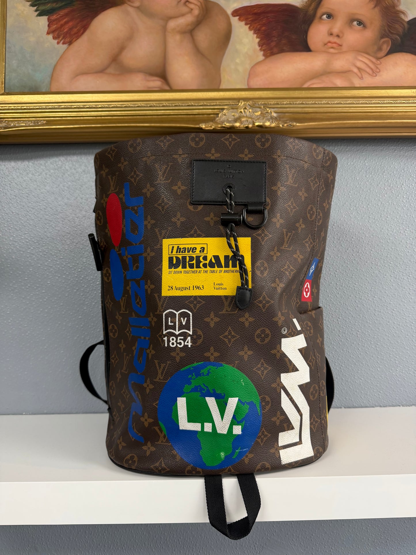 LOUIS VUITTON BROWN STORY MONOGRAM CHALK BACKPACK