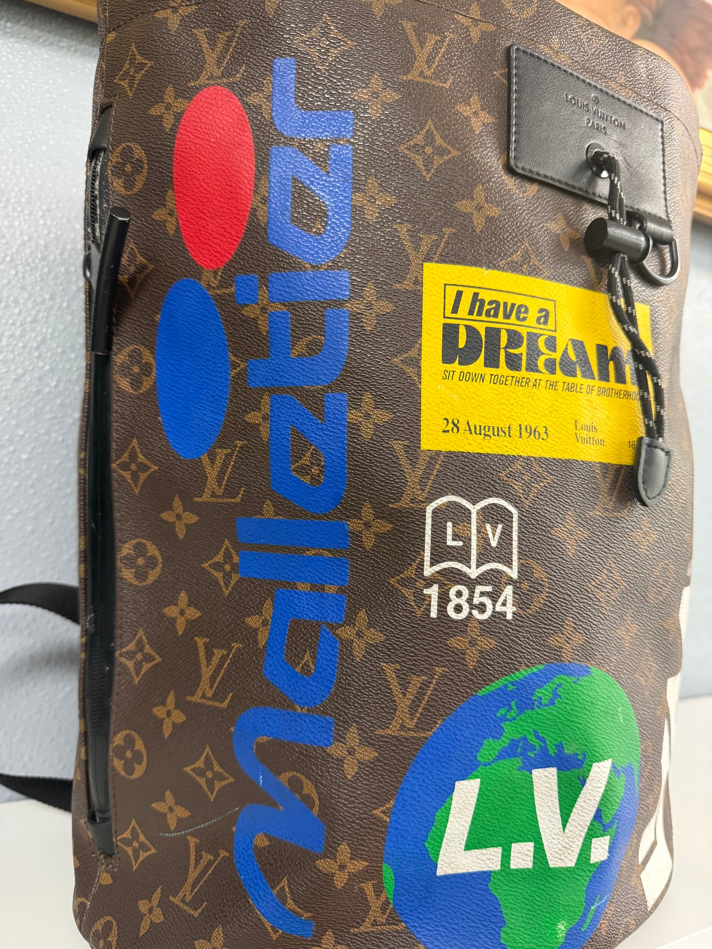 LOUIS VUITTON BROWN STORY MONOGRAM CHALK BACKPACK