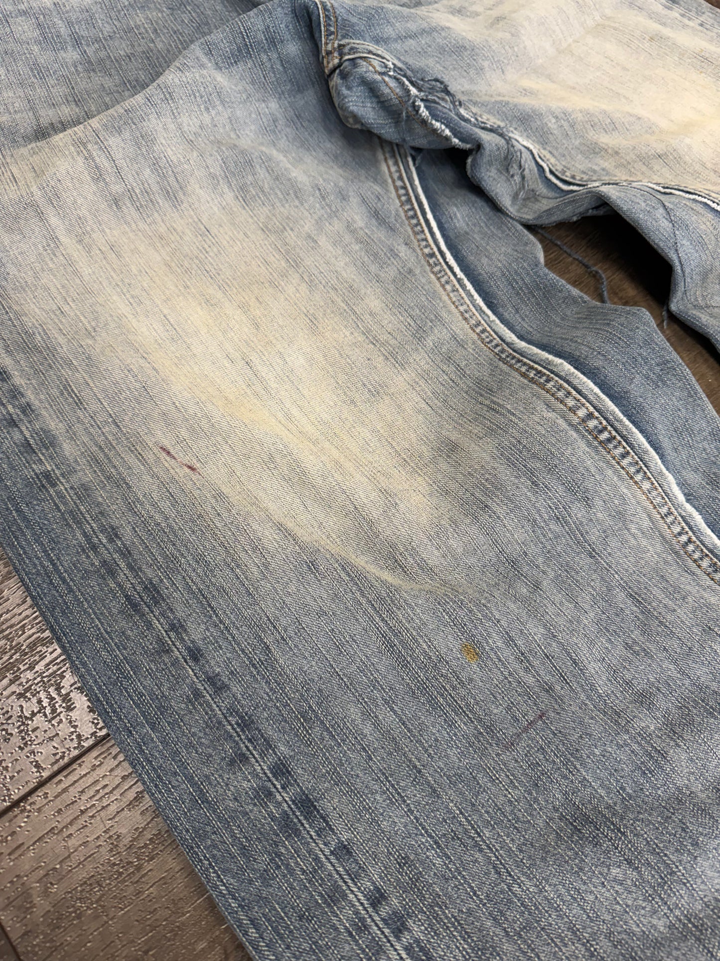 BALENCIAGA CUT UP DISTRESSED LAYRED JEANS (S)