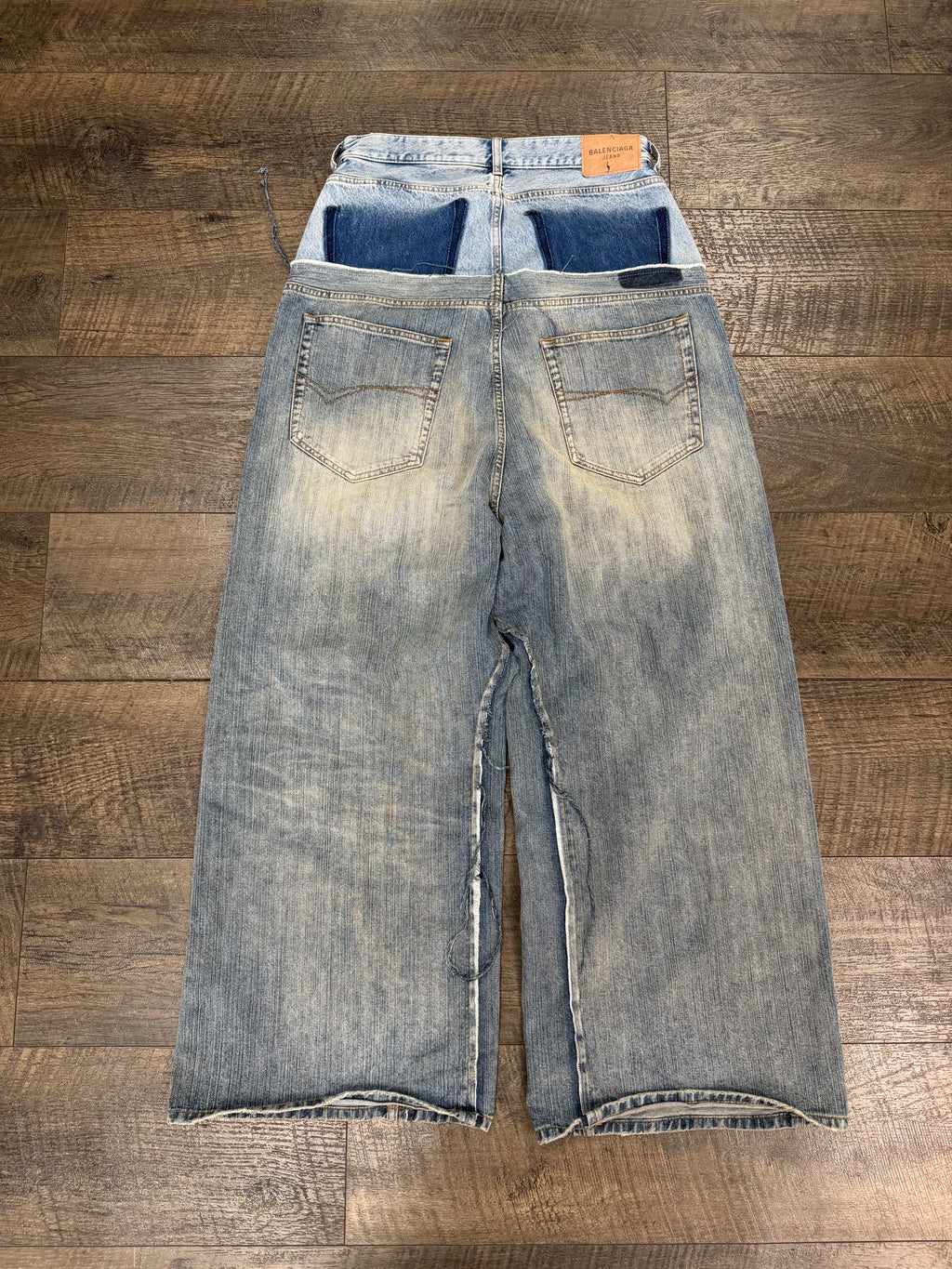 BALENCIAGA CUT UP DISTRESSED LAYRED JEANS (S)