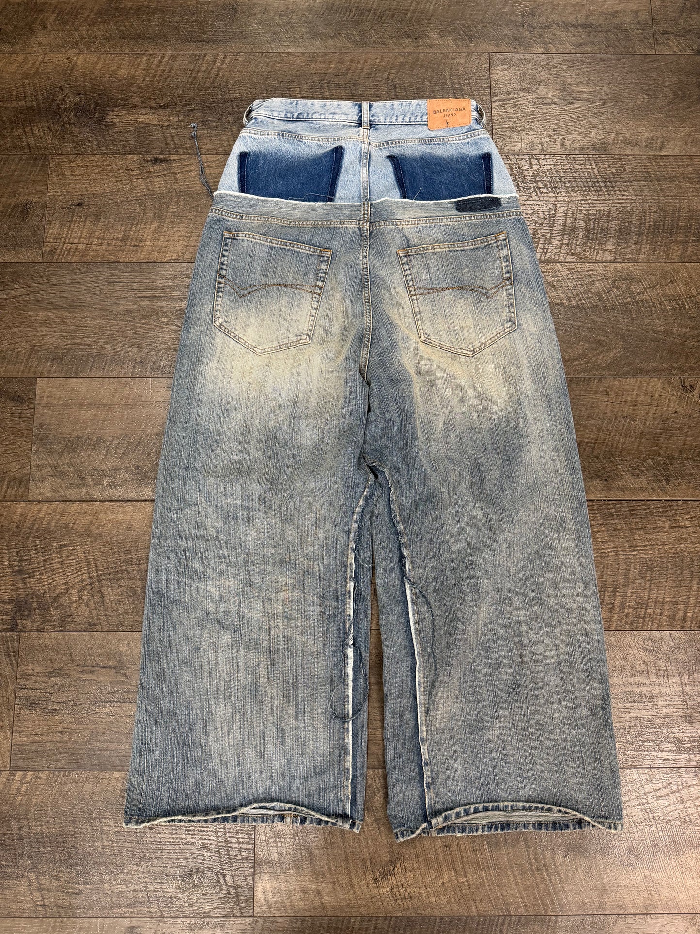 BALENCIAGA CUT UP DISTRESSED LAYRED JEANS (S)