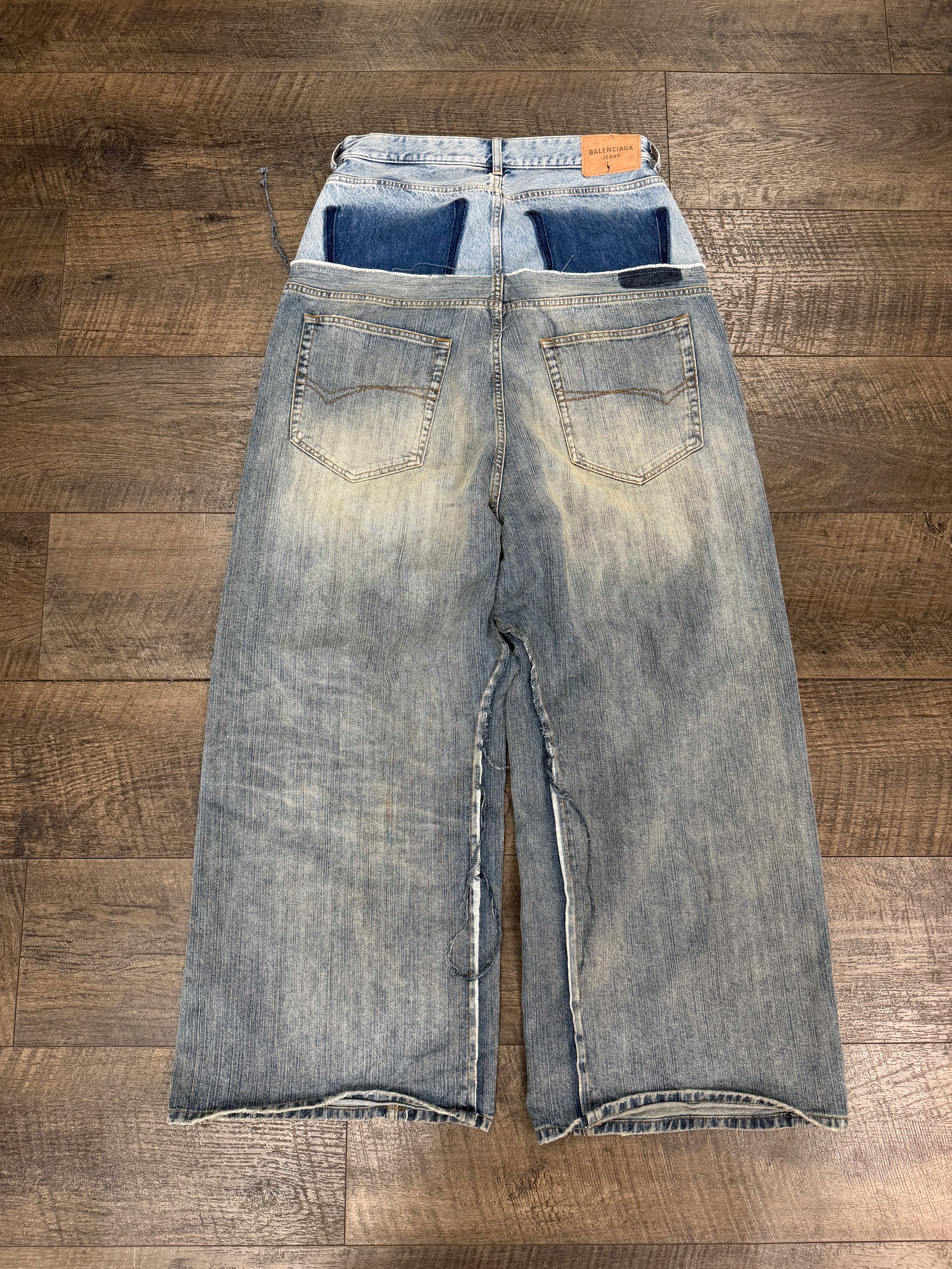 BALENCIAGA CUT UP DISTRESSED LAYRED JEANS (S)