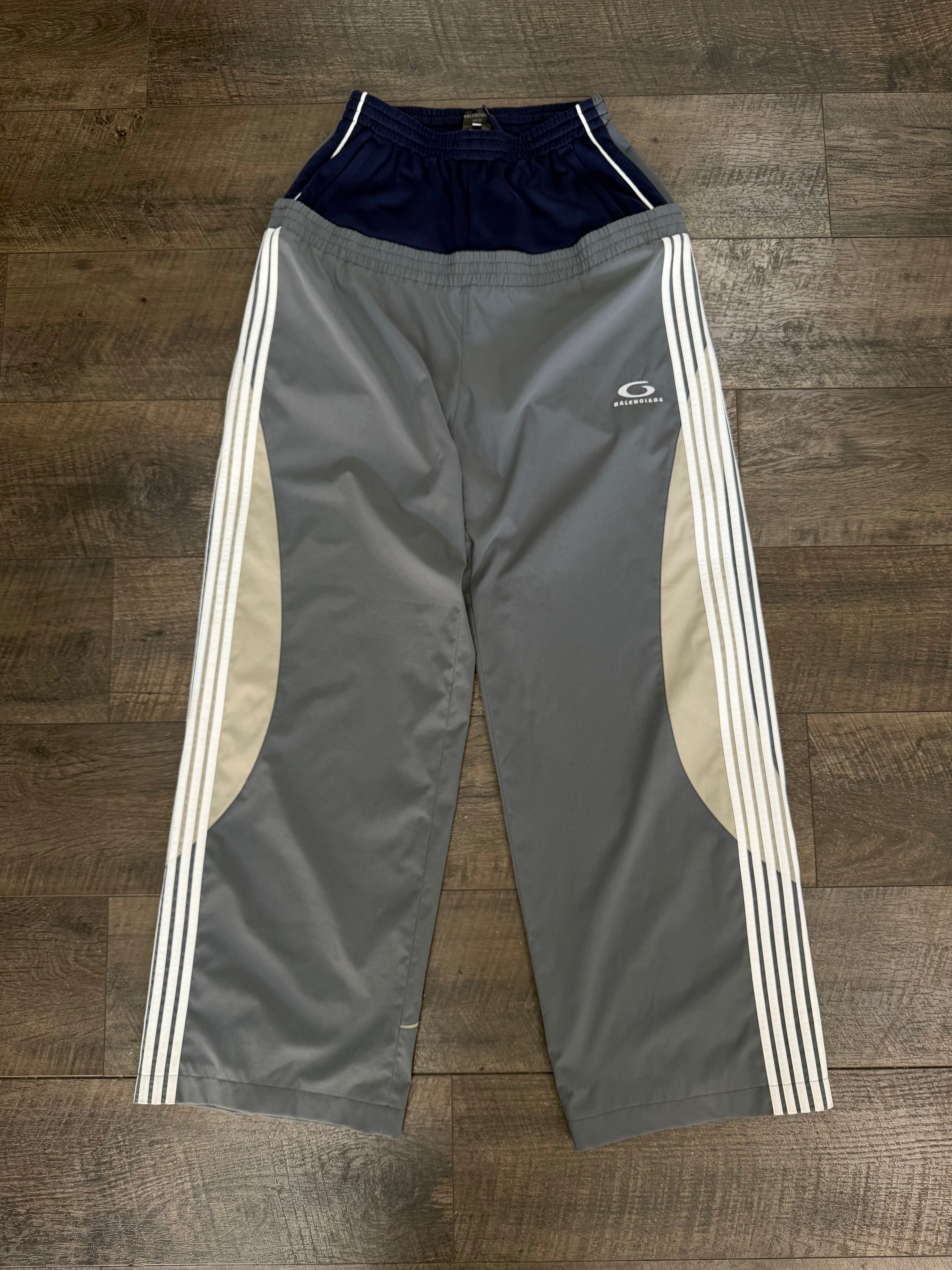 BALENCIAGA CUT UP TRACK PANTS (S)
