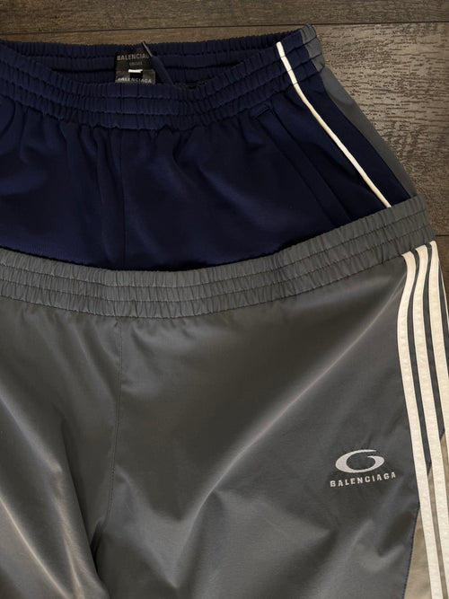 BALENCIAGA CUT UP TRACK PANTS (S)