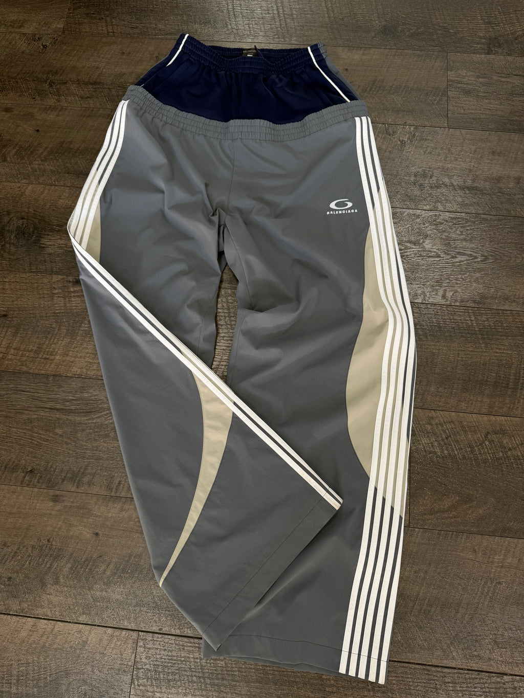 BALENCIAGA CUT UP TRACK PANTS (S)
