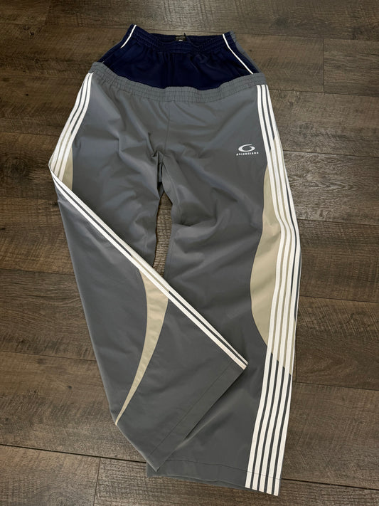 BALENCIAGA CUT UP TRACK PANTS (S)