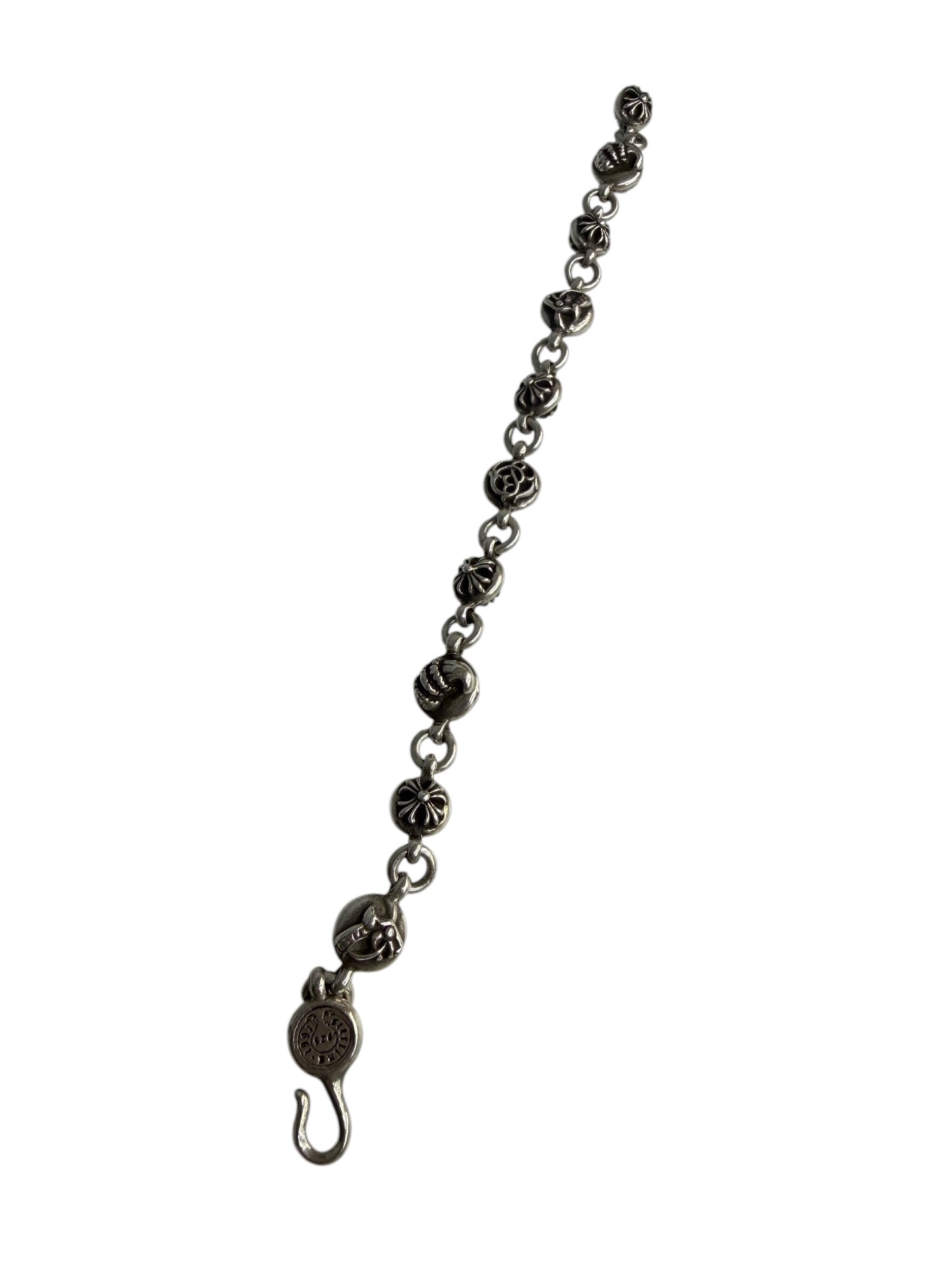 Performa Chrome Hearts sterling silver link bracelet with oxidized gothic cross and knot charms and hook closure.