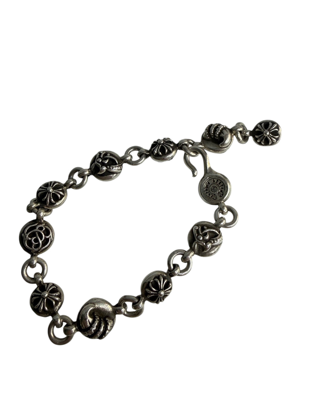 Performa Chrome Hearts sterling silver link bracelet with oxidized gothic cross and knot charms and hook closure.