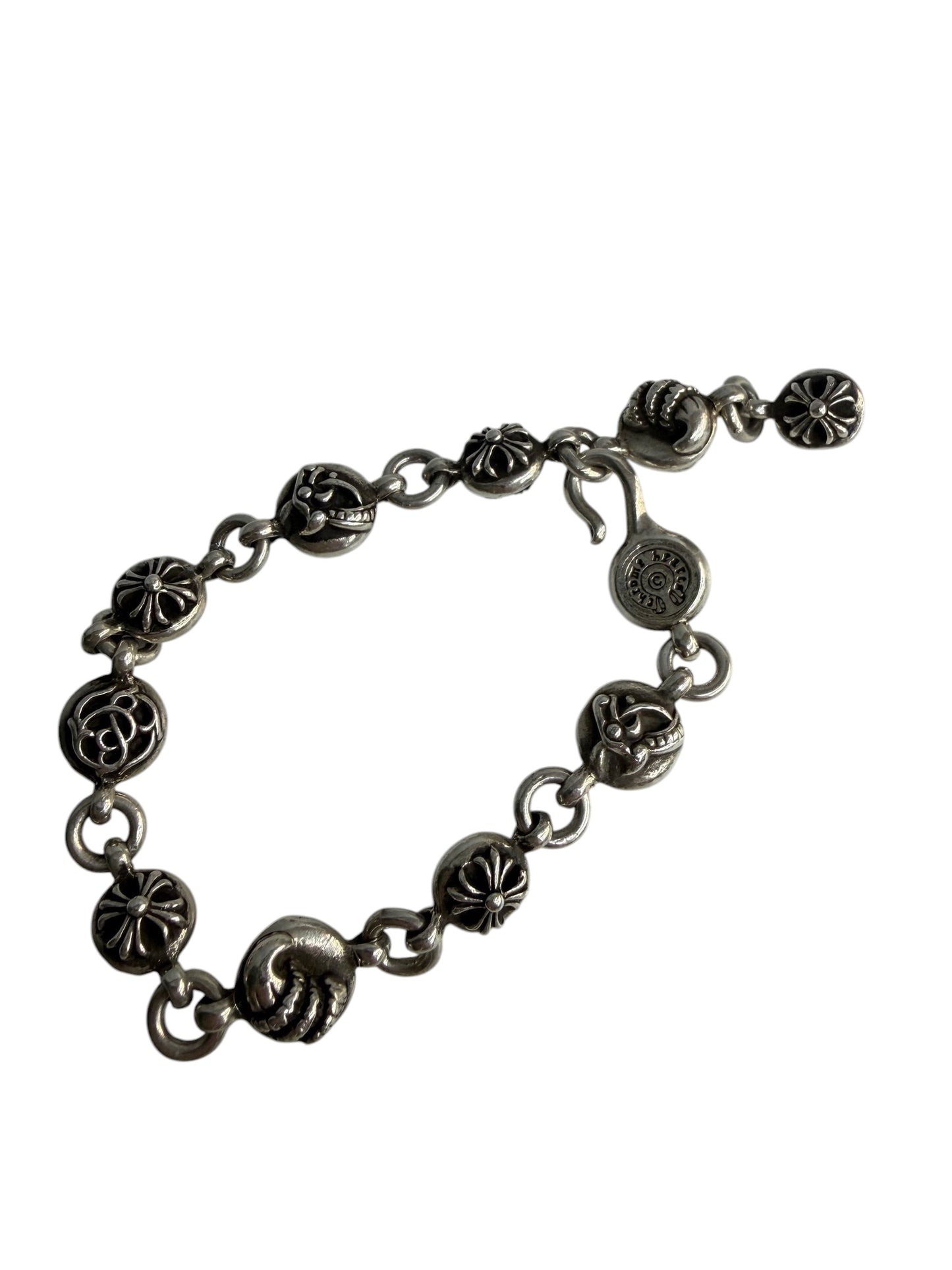 Performa Chrome Hearts sterling silver link bracelet with oxidized gothic cross and knot charms and hook closure.